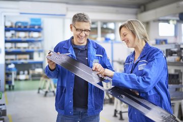 BENTELER Automotive Paderborn Talle employees working on battery trays 